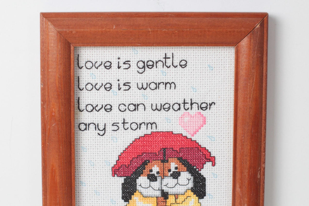 Vintage Framed Cross Stitch “Love Is Gentle” with Dogs Under Umbrella Heart
