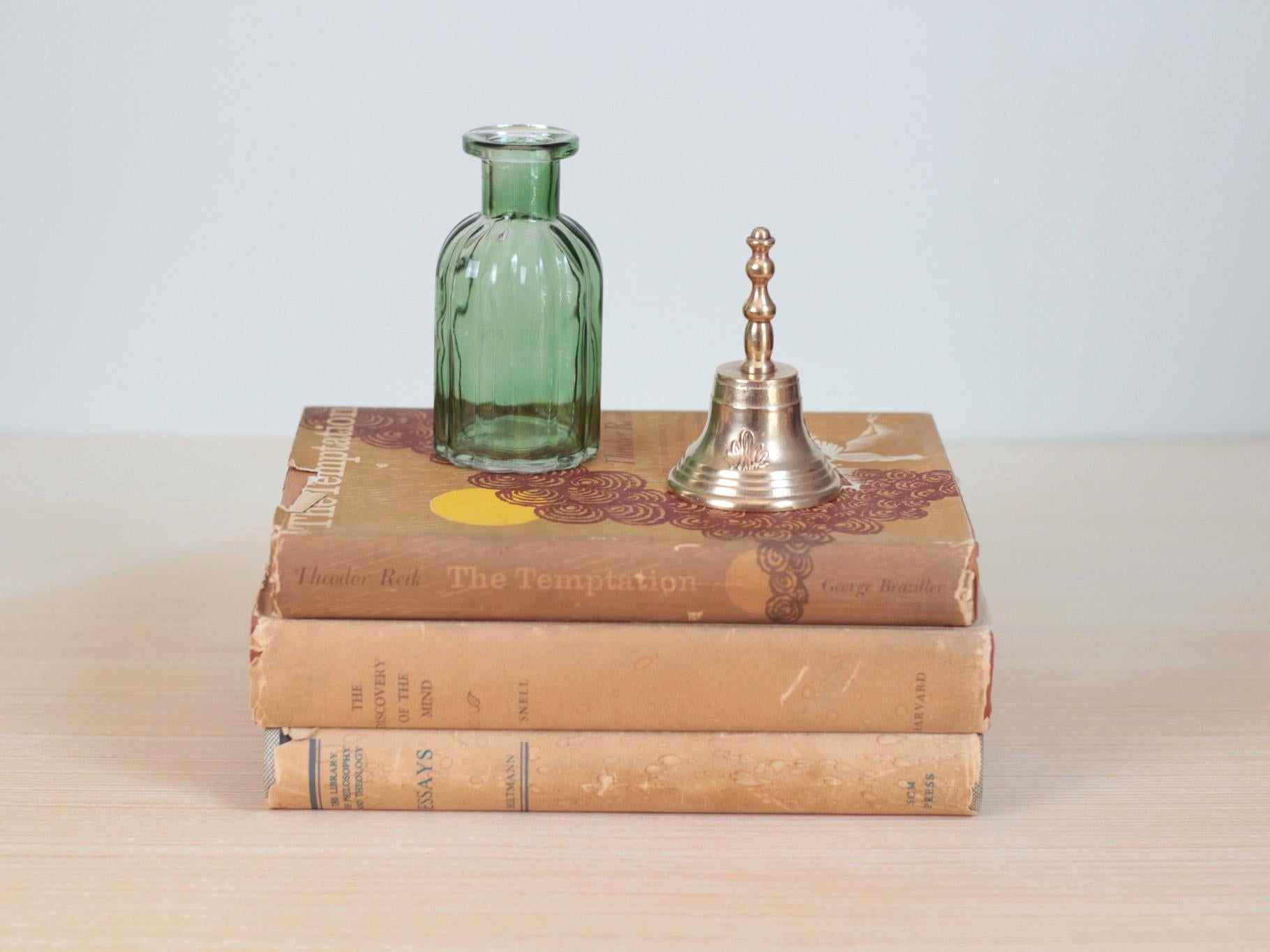 Vintage Midcentury Brass Hand Bell with Raised Floral Motif