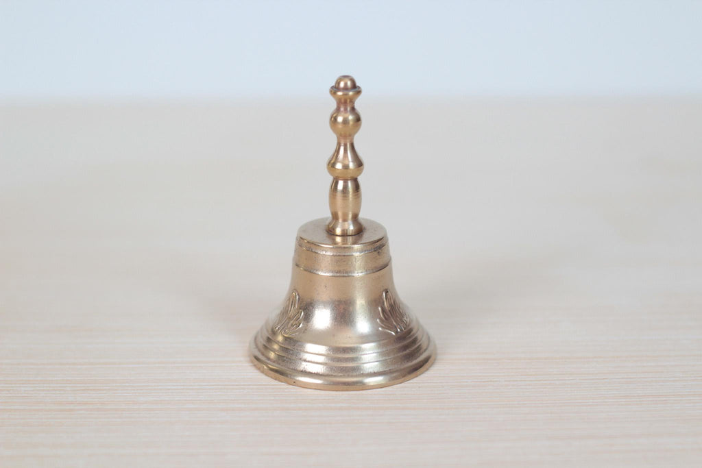 Vintage Midcentury Brass Hand Bell with Raised Floral Motif