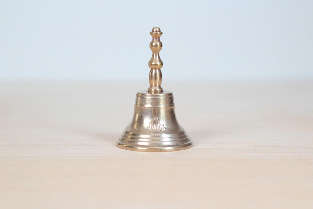 Vintage Midcentury Brass Hand Bell with Raised Floral Motif