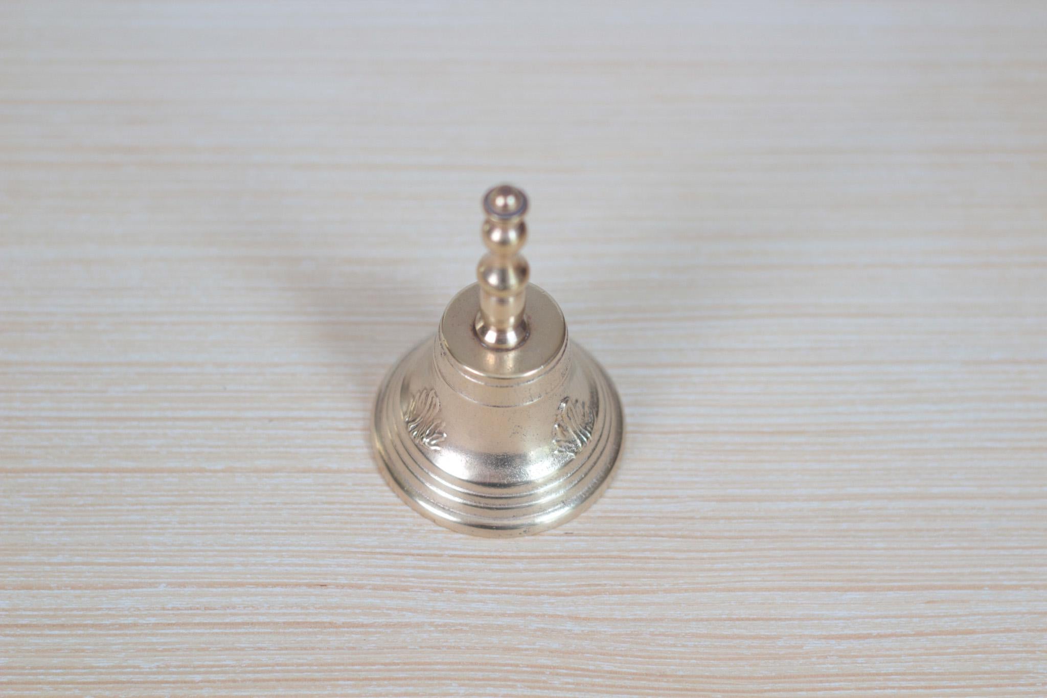 Vintage Midcentury Brass Hand Bell with Raised Floral Motif