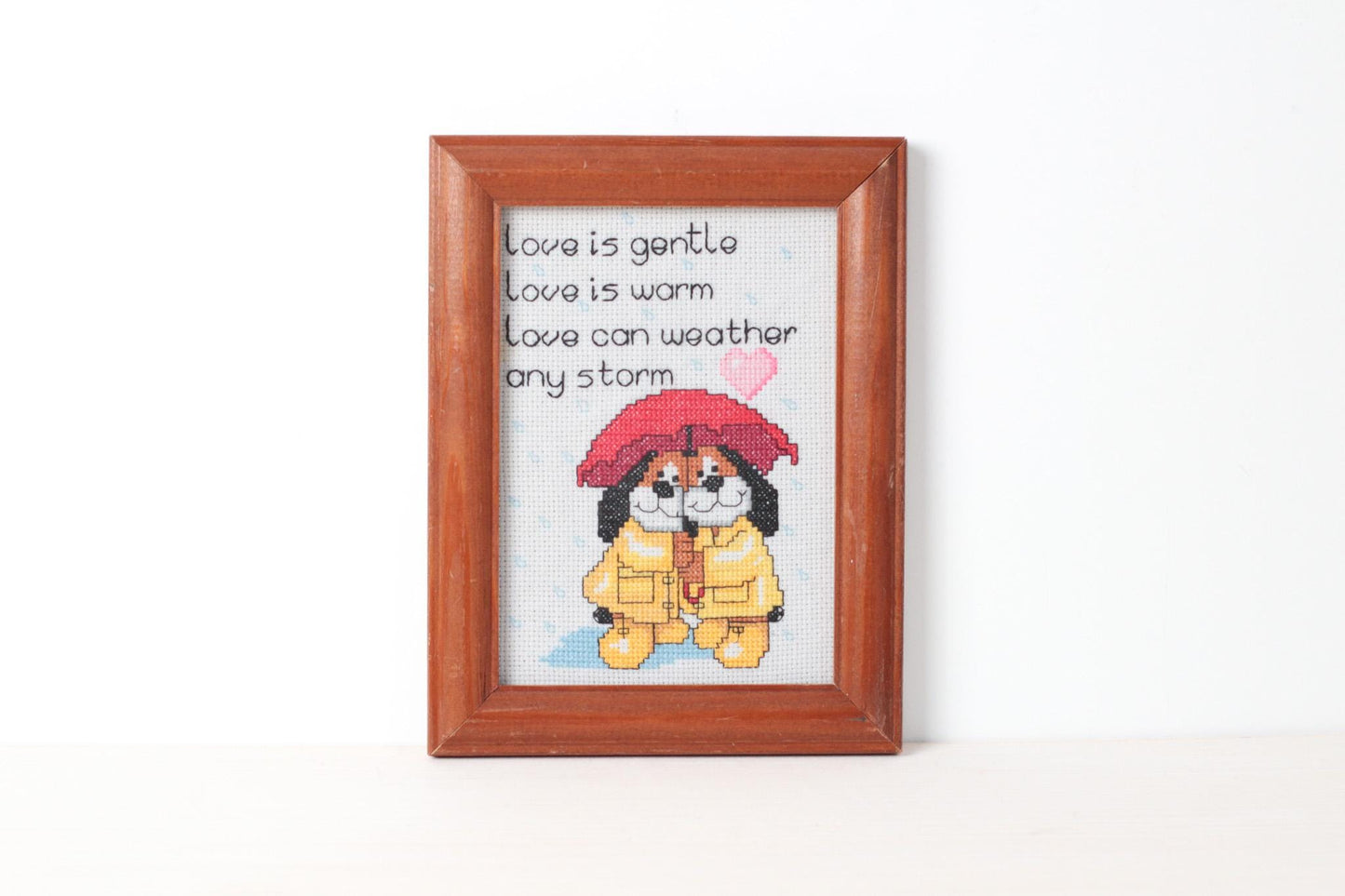 Vintage Framed Cross Stitch “Love Is Gentle” with Dogs Under Umbrella Heart