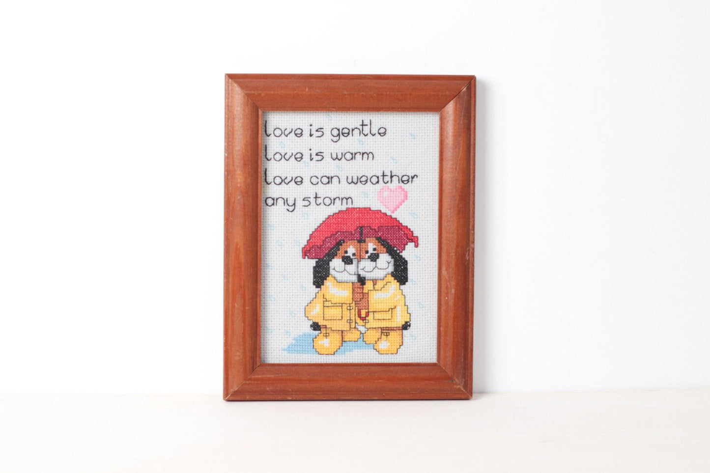 Vintage Framed Cross Stitch “Love Is Gentle” with Dogs Under Umbrella Heart